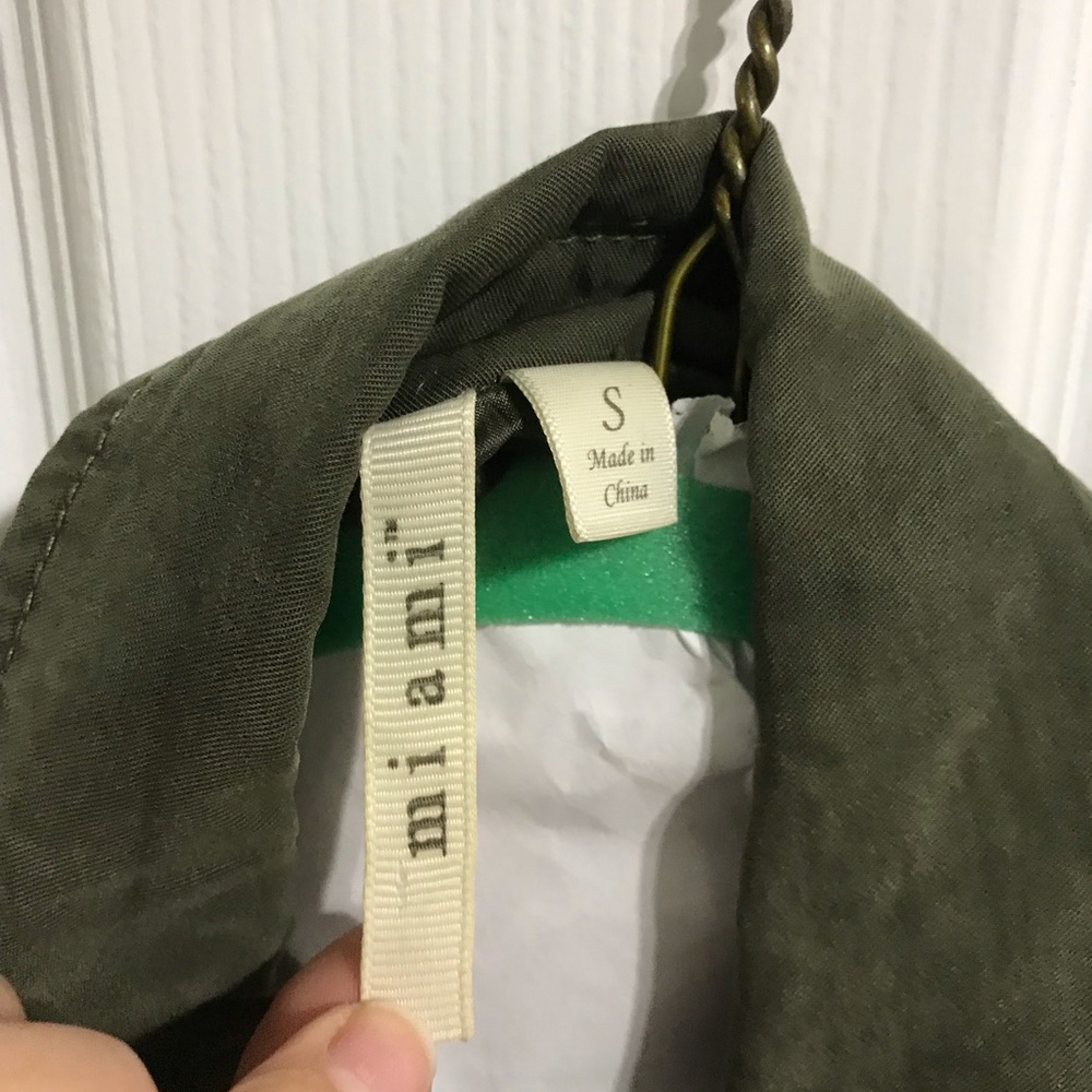 Long green vest